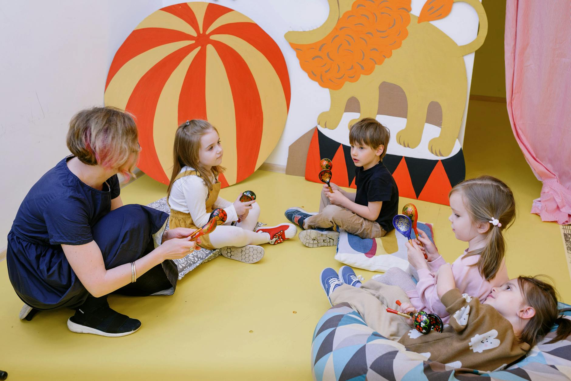 children playing on yellow floor